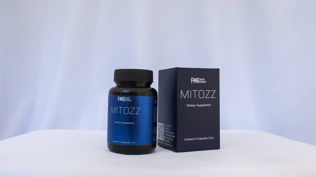 daily digest digestive enzymes capsule bottle next to fresh vegetables for gut health
